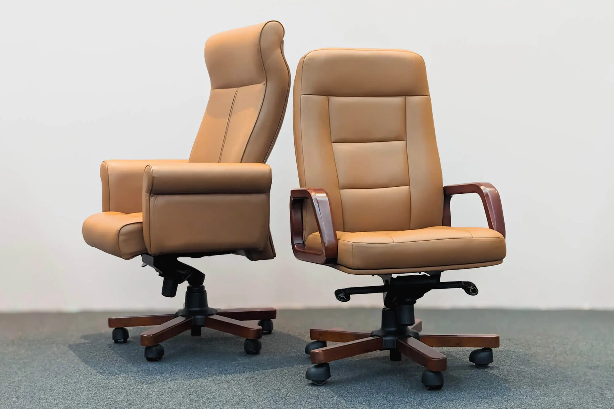 High-back executive chair supporting the full spine during long meetings
