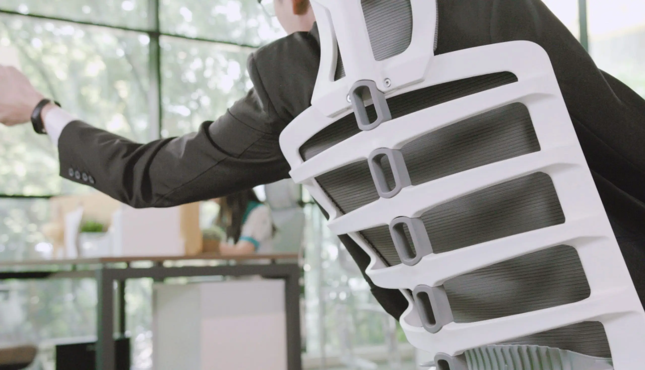 Ergonomic chair with anatomically shaped lumbar support designed for the natural curve of the spine